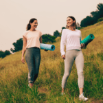Women walking briskly outdoors for mental health and longevity